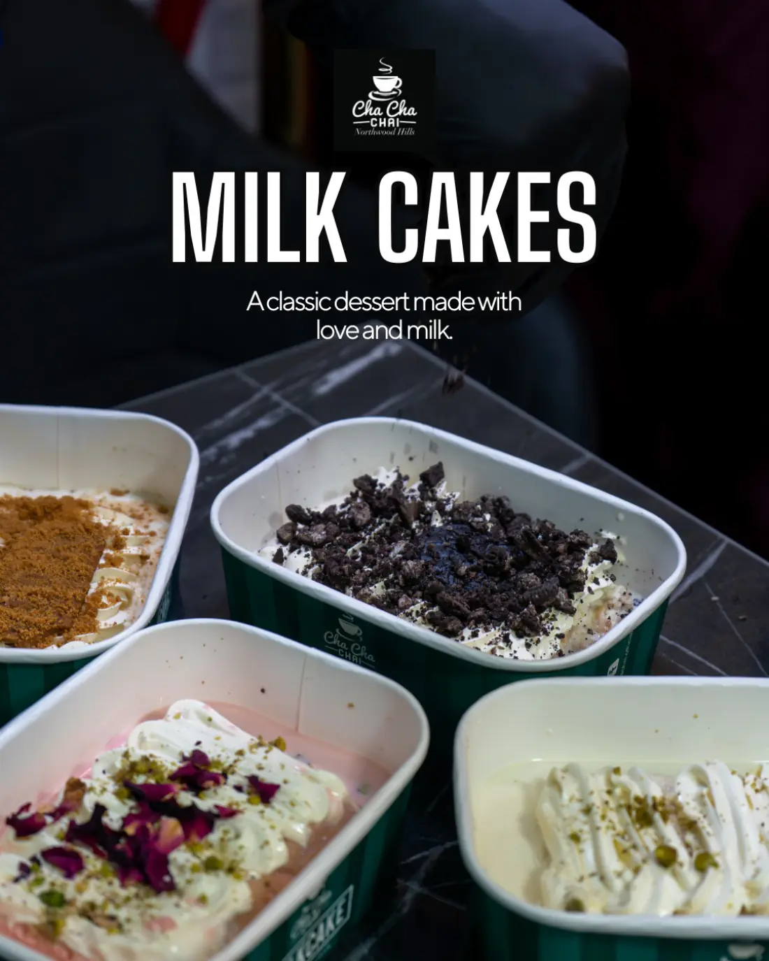 Four milkcakes in tubs at Cha Cha Chai Northwood Hills, topped with pistachio, crushed Oreo, Biscoff crumb and rose petals